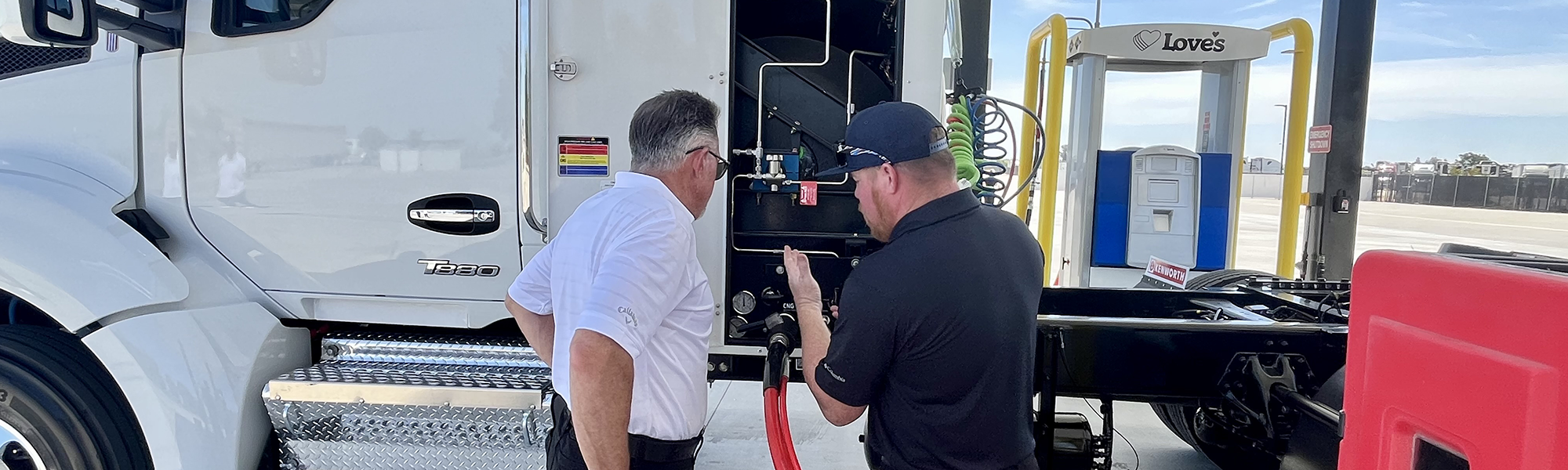 A photo of people at the pumps at a Love's Alternative Energy station