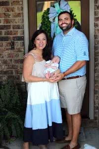 Raychal, Jud and Boyce Roberts at home