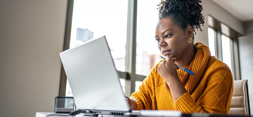 Woman looking at a laptop