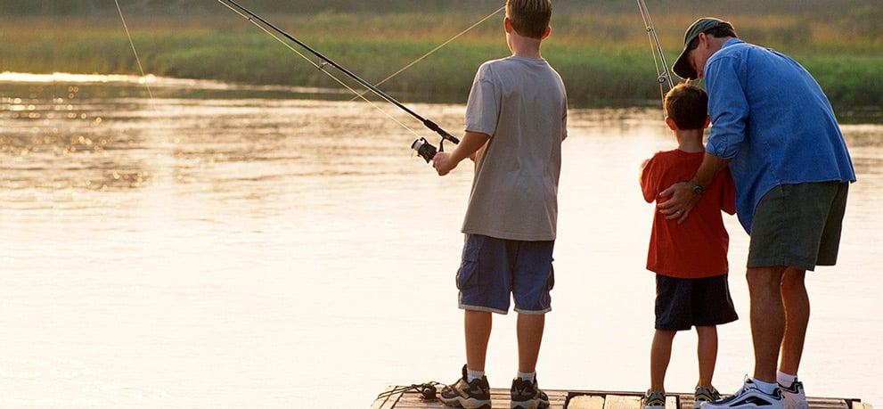 Father and sons fishing