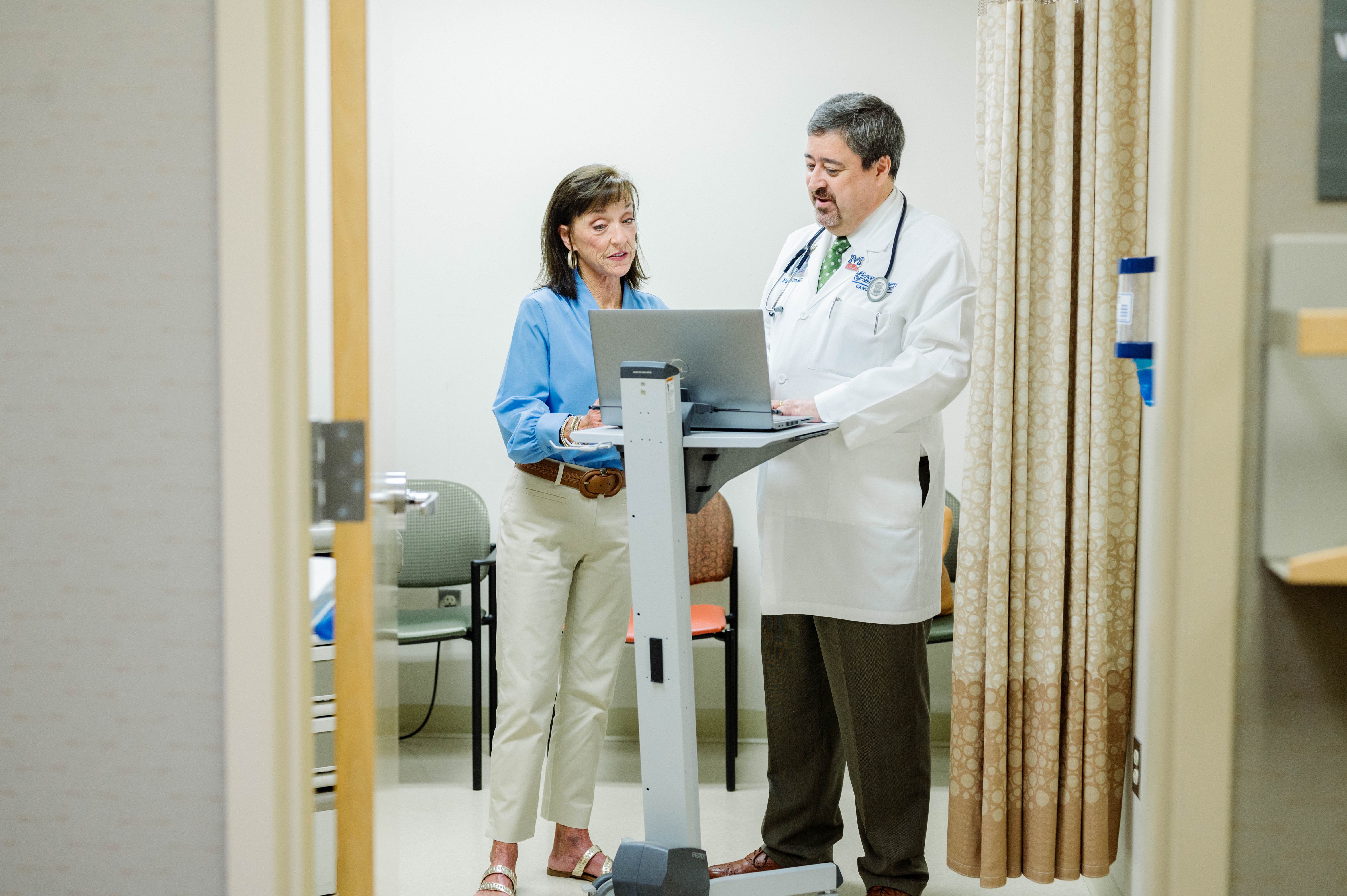 Doctor and patients discussing care