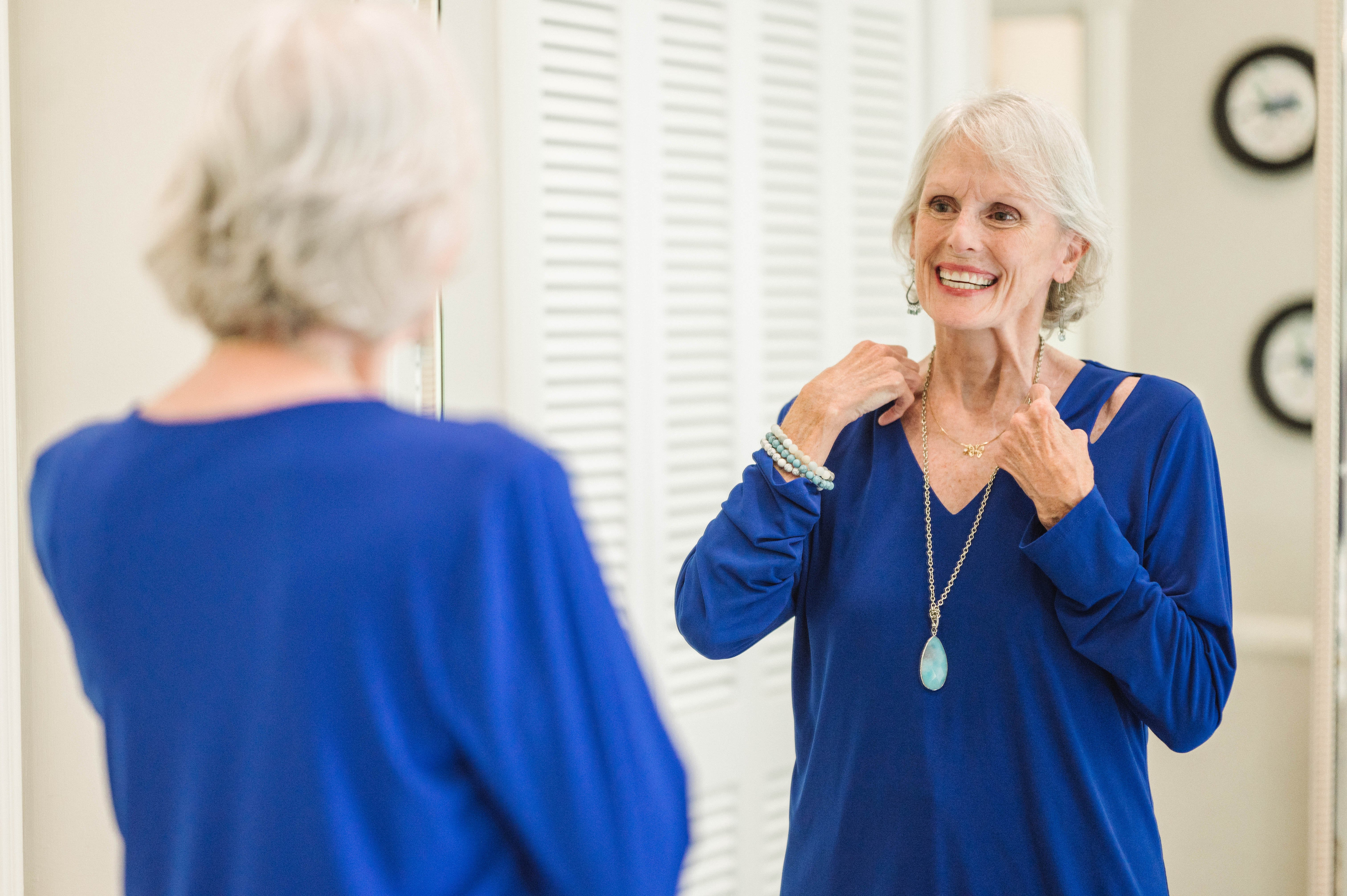 Woman looking in the mirror