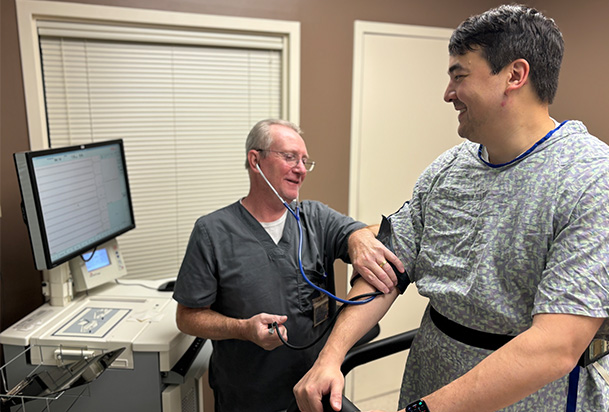 male nurse doing a study on a male patient