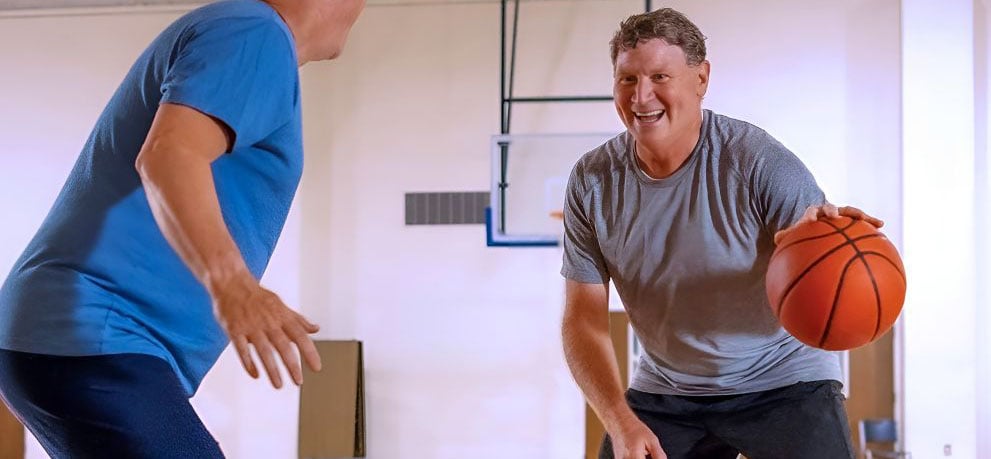 Heart patient, Brett Hildenbrand, playing basketball