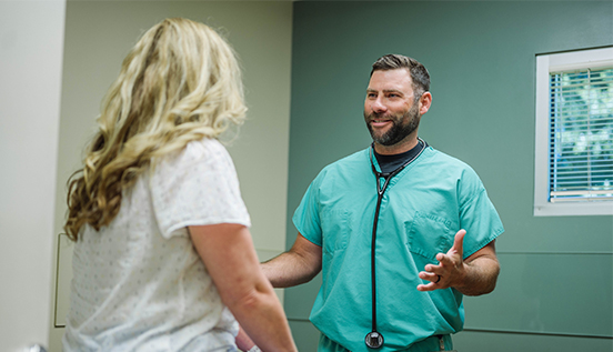 Doctor speaking with patient