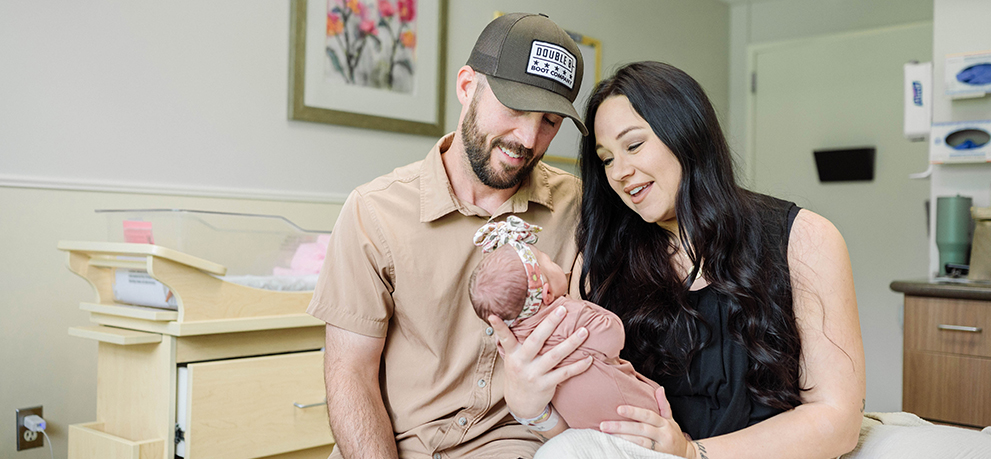 Couple with newborn baby