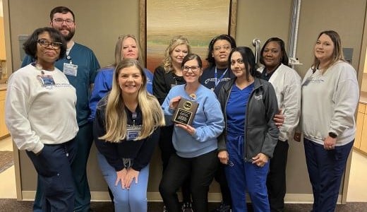 The NMMC Hematology Oncology Laboratory team celebrates the COLA Laboratory Excellence Award.