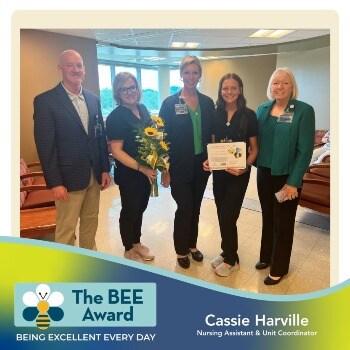 Cassie Harville receiving BEE Award