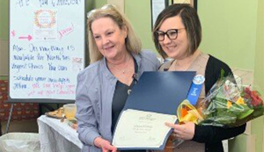 Alaina Collins receives award