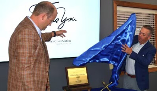 unveiling community room plaque