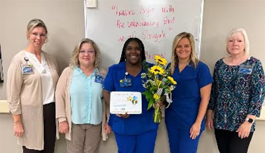Courtney Johnson receives award