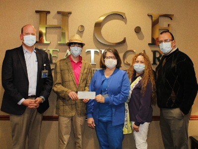 Elias donates to Hospice fund