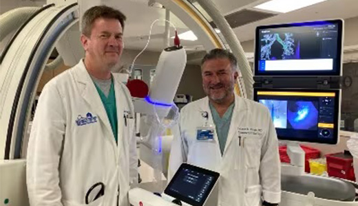 Staff in front of new Ion machine
