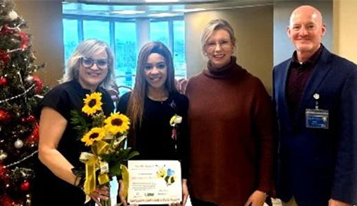 Presenting Mackenzie Bearden with the bee award