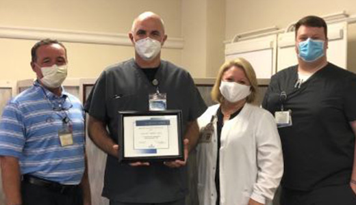 Congratulating Mike Dodson (third from left) as NMMC-West Point’s newest Employee of the Quarter are Will Mitchell, nursing supervisor; Pam White, chief nursing officer; and Barry Keel, administrator.