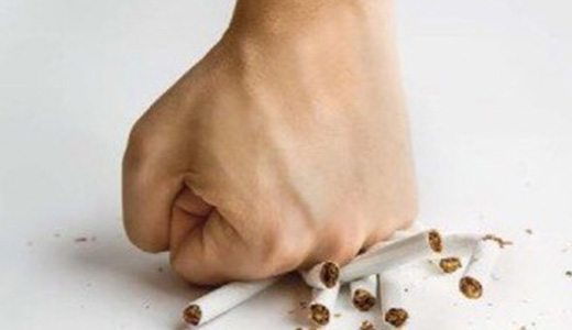 fist crushing cigarettes
