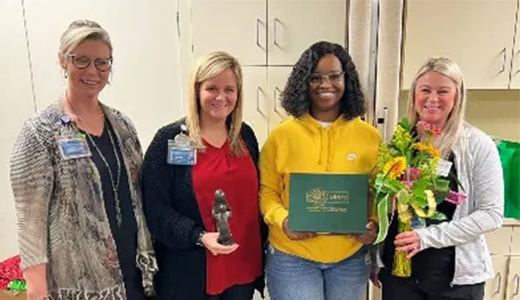 Watkins receives award