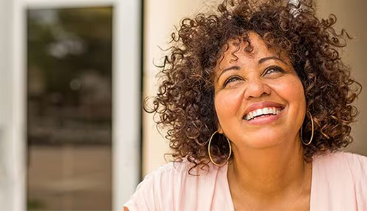 Woman looking up and smiling