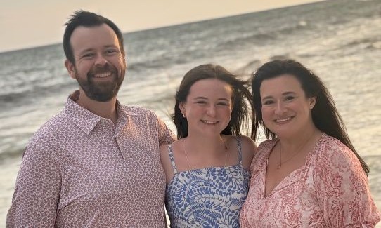 Cancer survivor Morgan Williamson with husband, Hunter, and daughter, Macy.