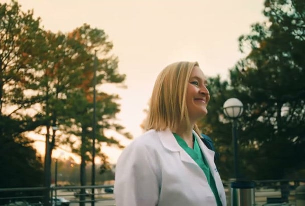 Dr. Dakota King walking into the East Tower at NMMC-Tupelo