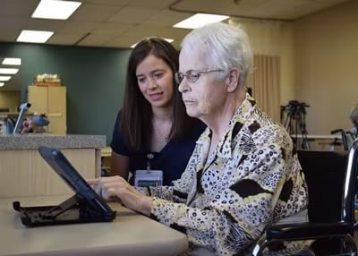 Therapist working with resident