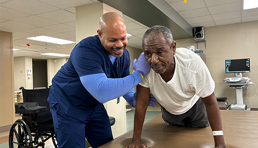 rehab institute therapist working with patient on table