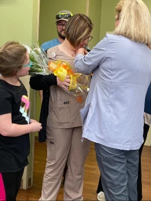 Alaina Collins receives award
