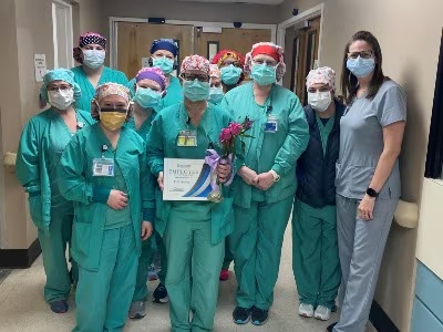 Brown with co-workers