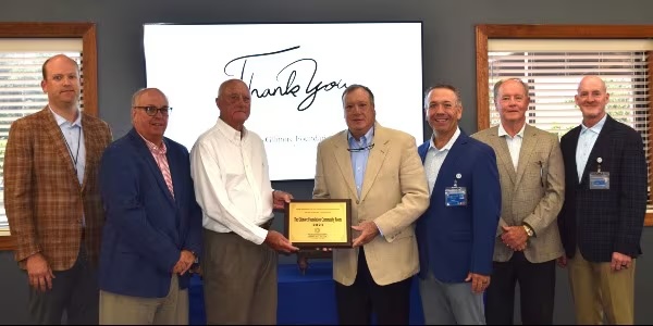 Plaque presentation with leaders