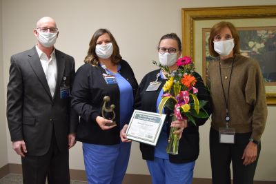 Becky Turner accepts Daisy award