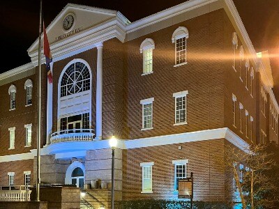 city hall lit up blue