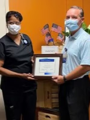 Janice Carter receives award