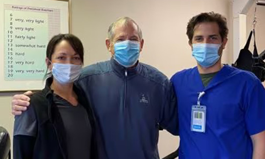 john smith and healthcare workers wearing masks
