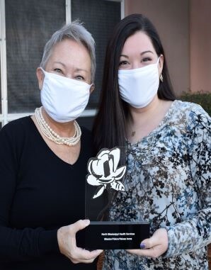 Leslie and Abby receive award
