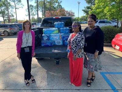 Women's center donates water