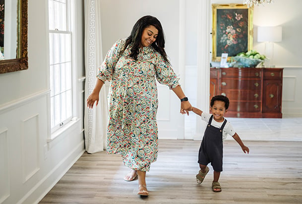 Woman plays with her son