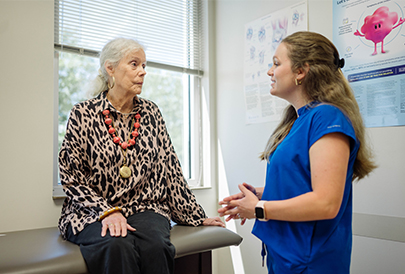 Doctor talking to older patient