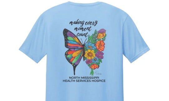 2026 NMHS Hospice T-shirt featuring butterfly art by Anne Reece Warren