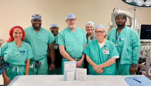 neurosurgery team in surgical suite