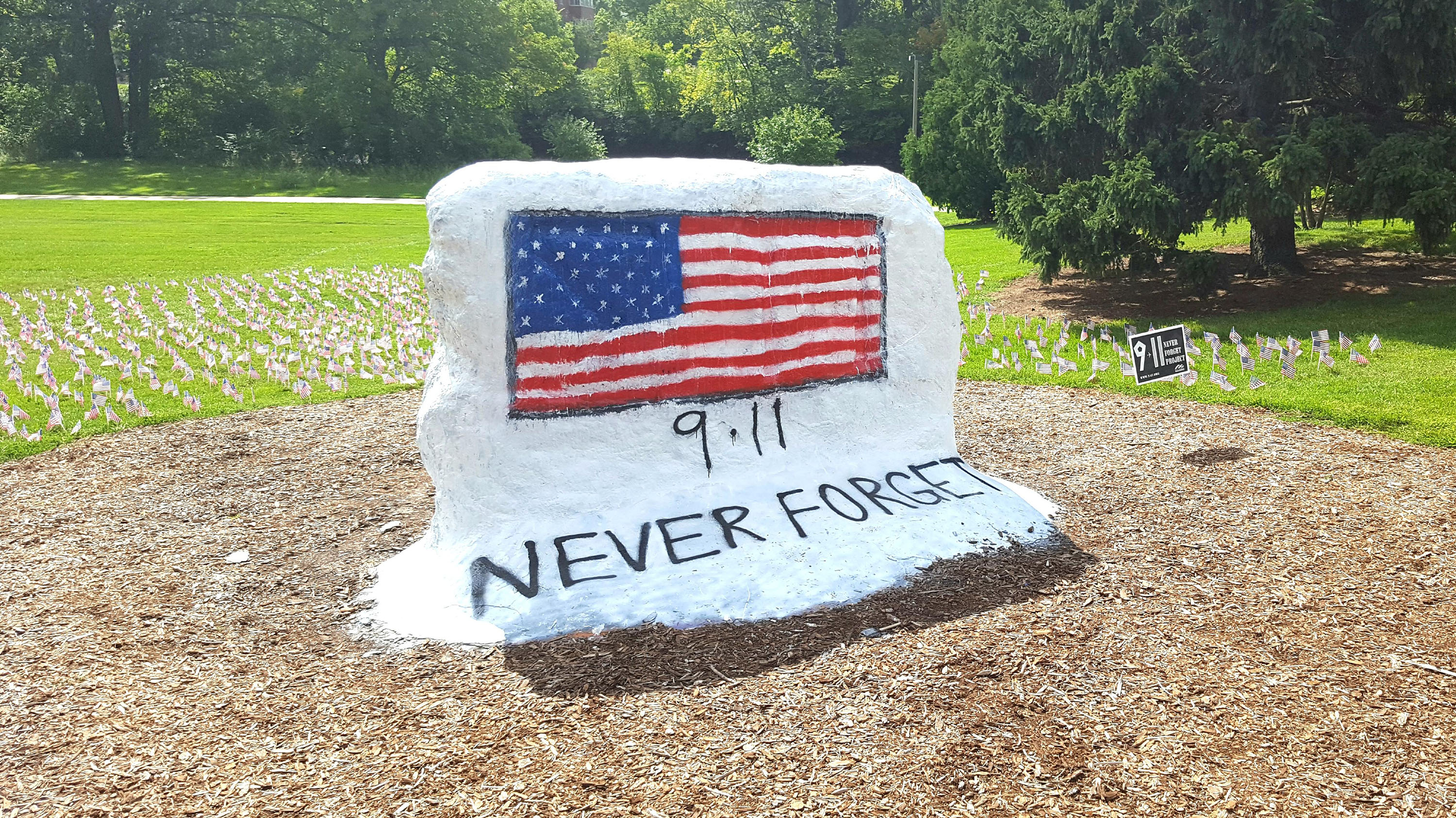 The Rock with an American Flag and words Never Forget 9/11