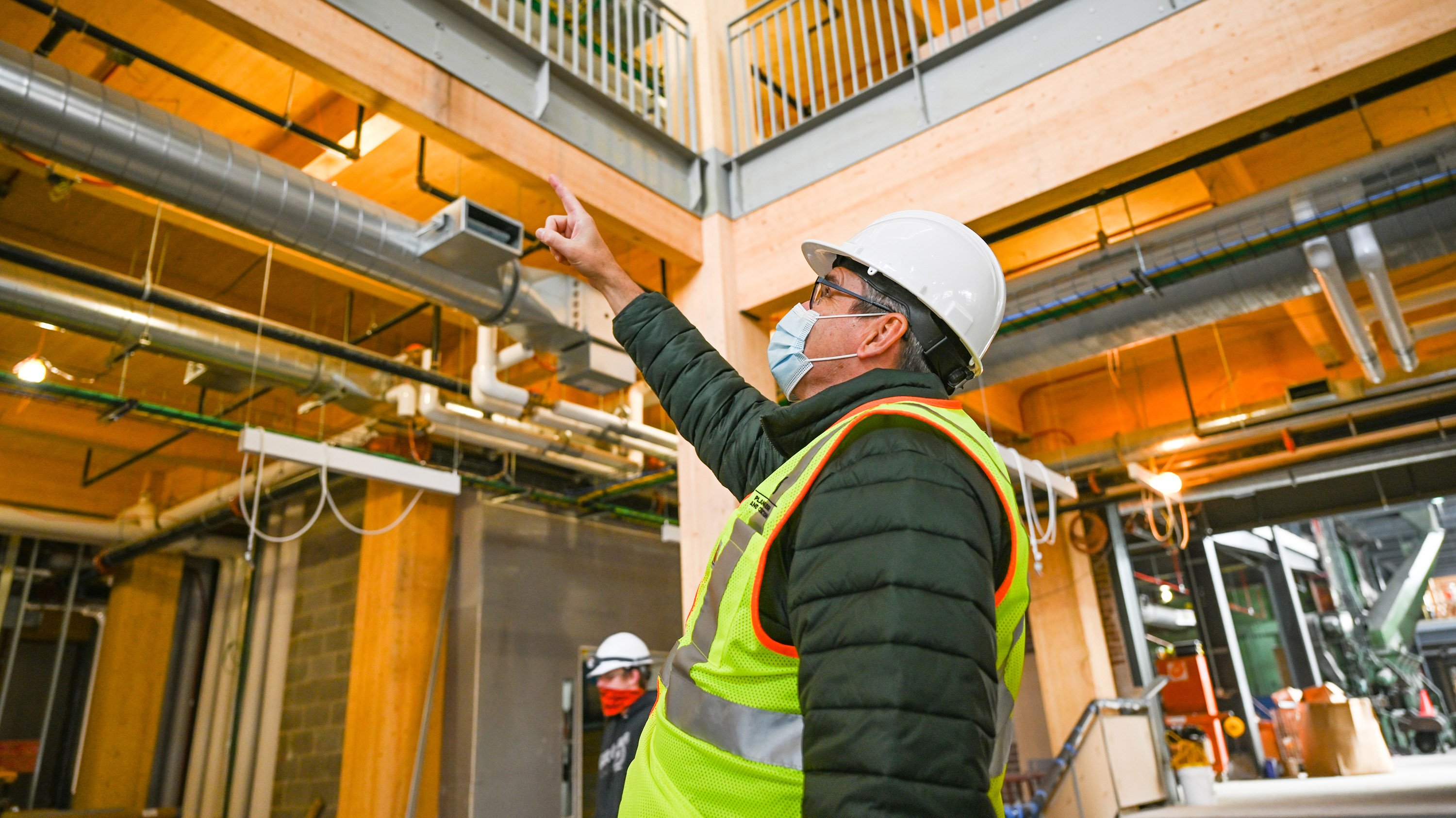 Construction workers in the STEM building