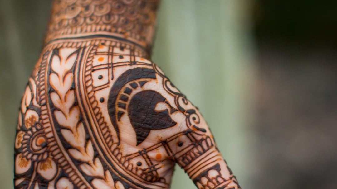 Hand with henna decoration, including the spartan helmet