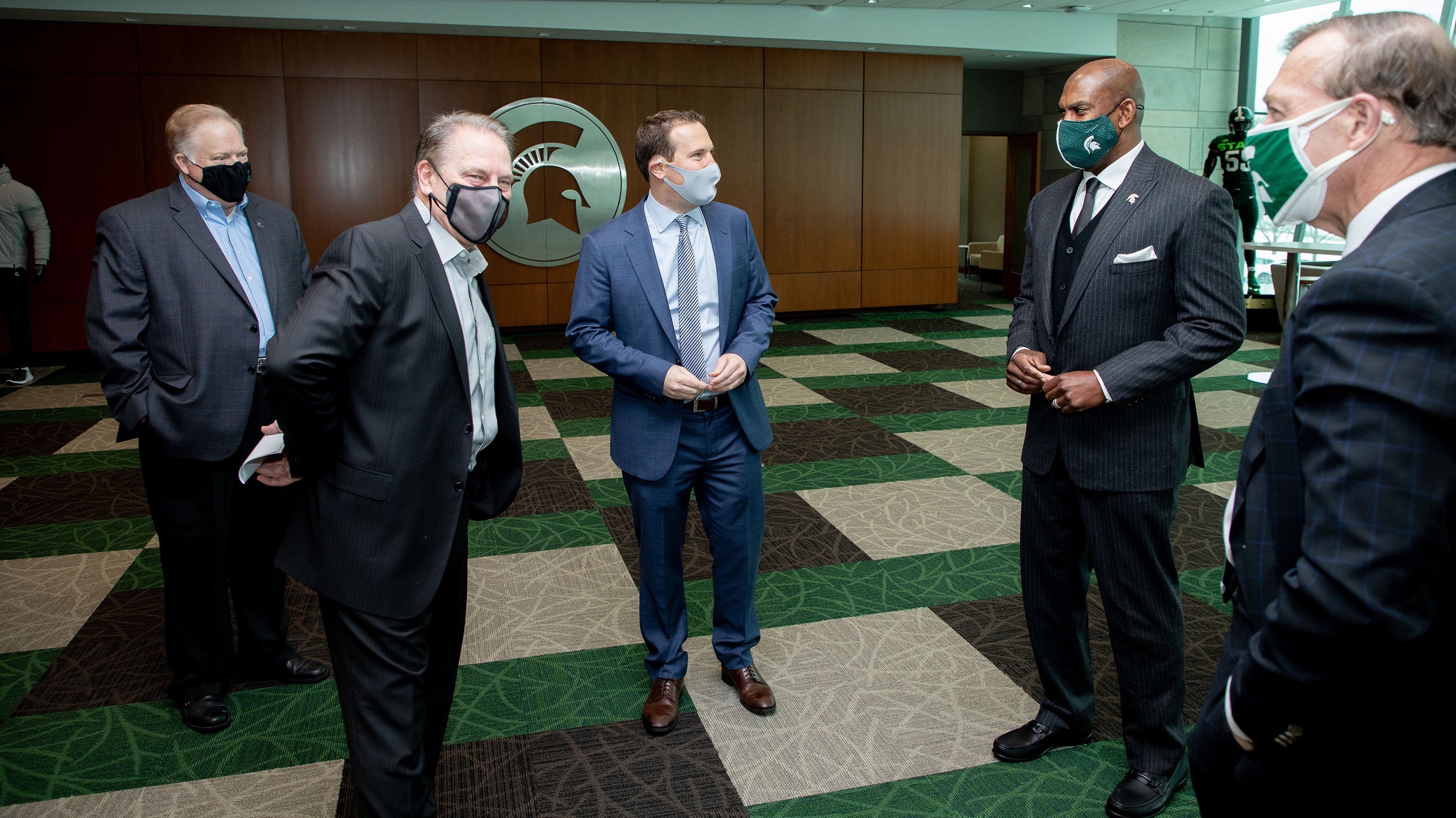 MSU officials talk with Mat Ishbia at a press conference