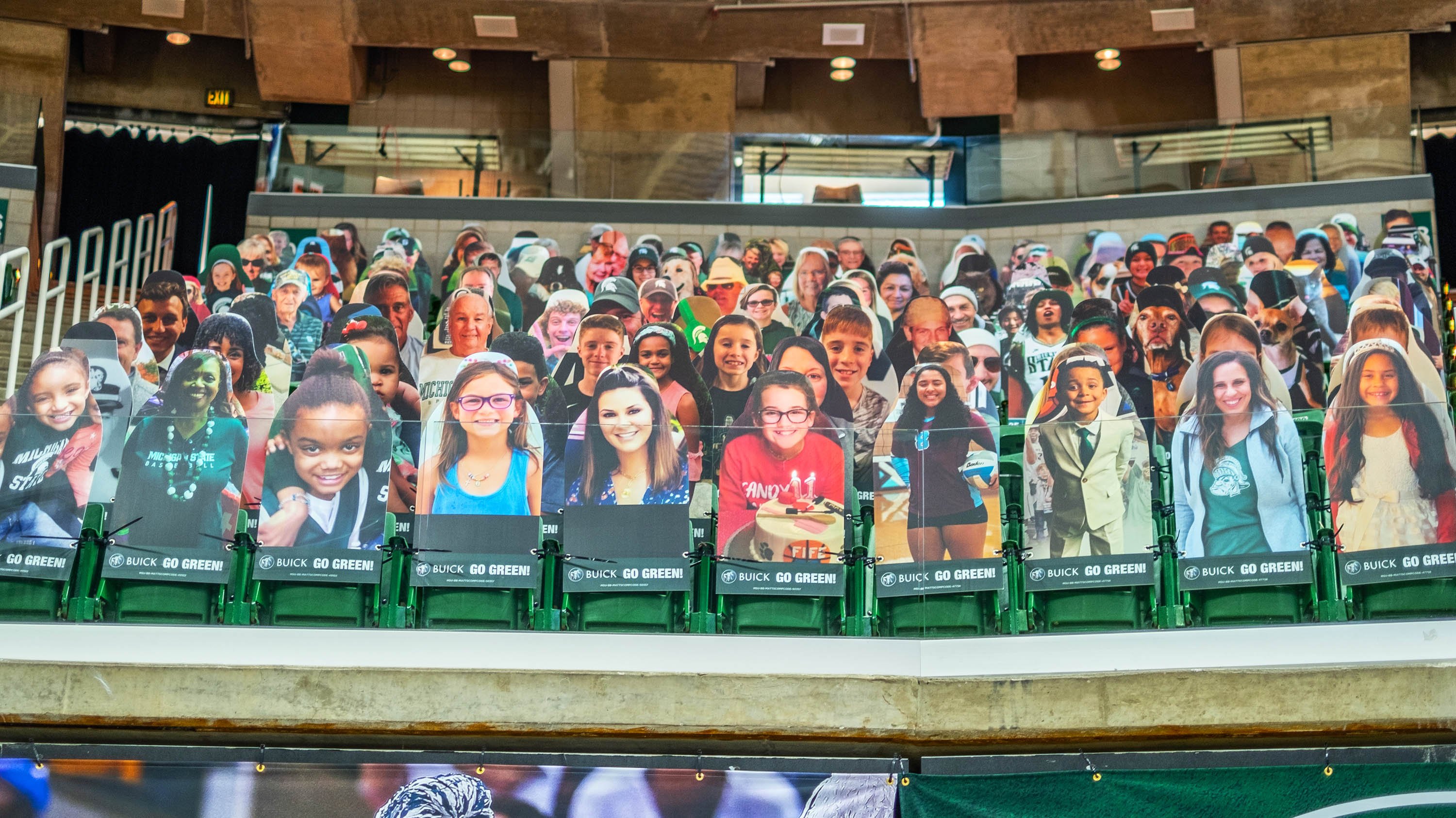 Cutouts of fans in the Breslin Center
