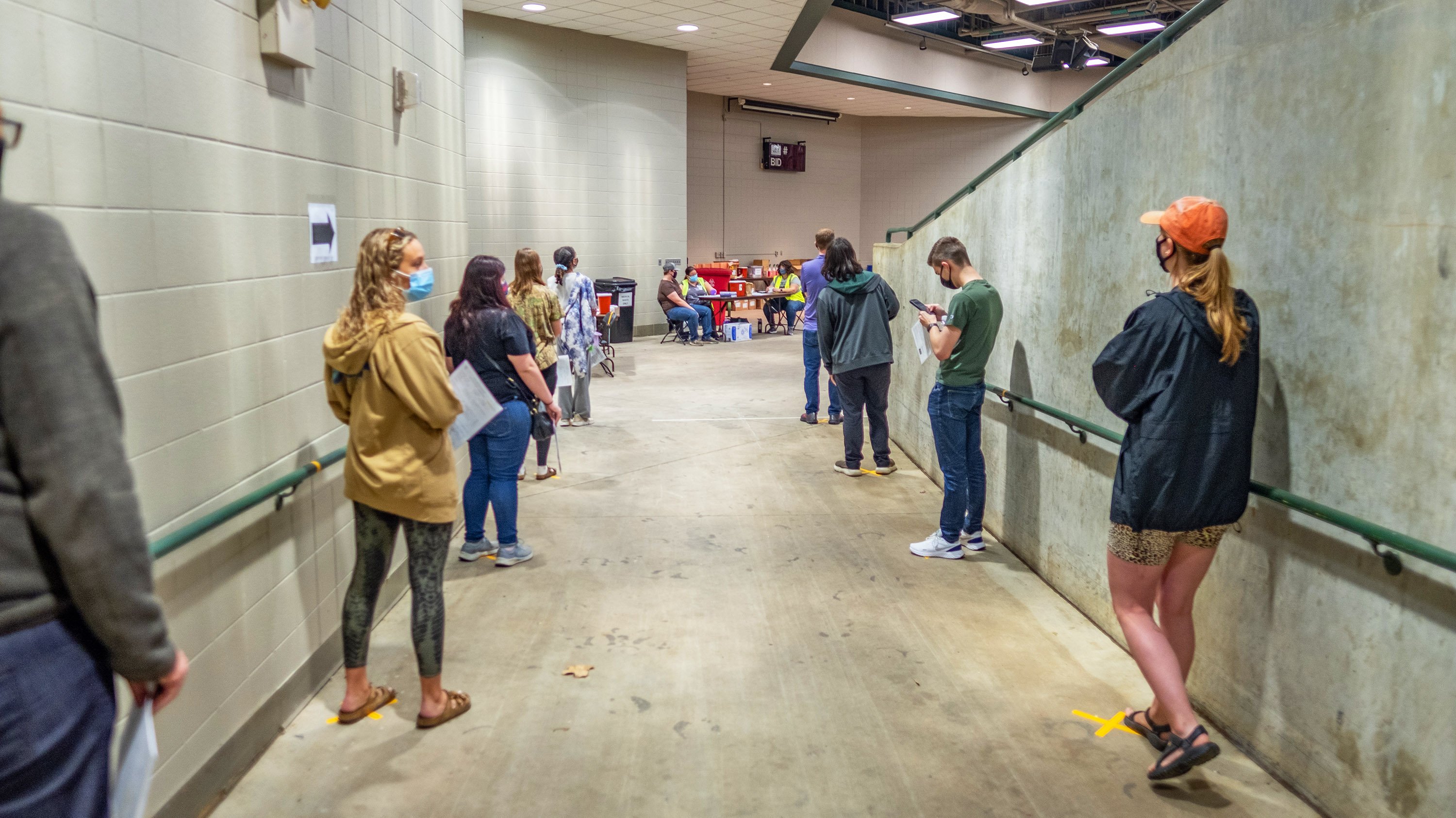 Students waiting in line for the COVID-19 vaccine