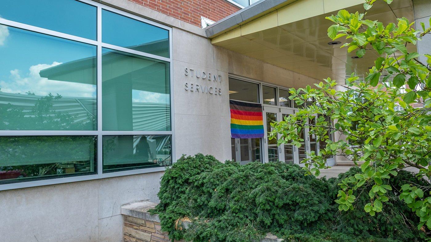 Pride flag displayed outside of Student Services Building