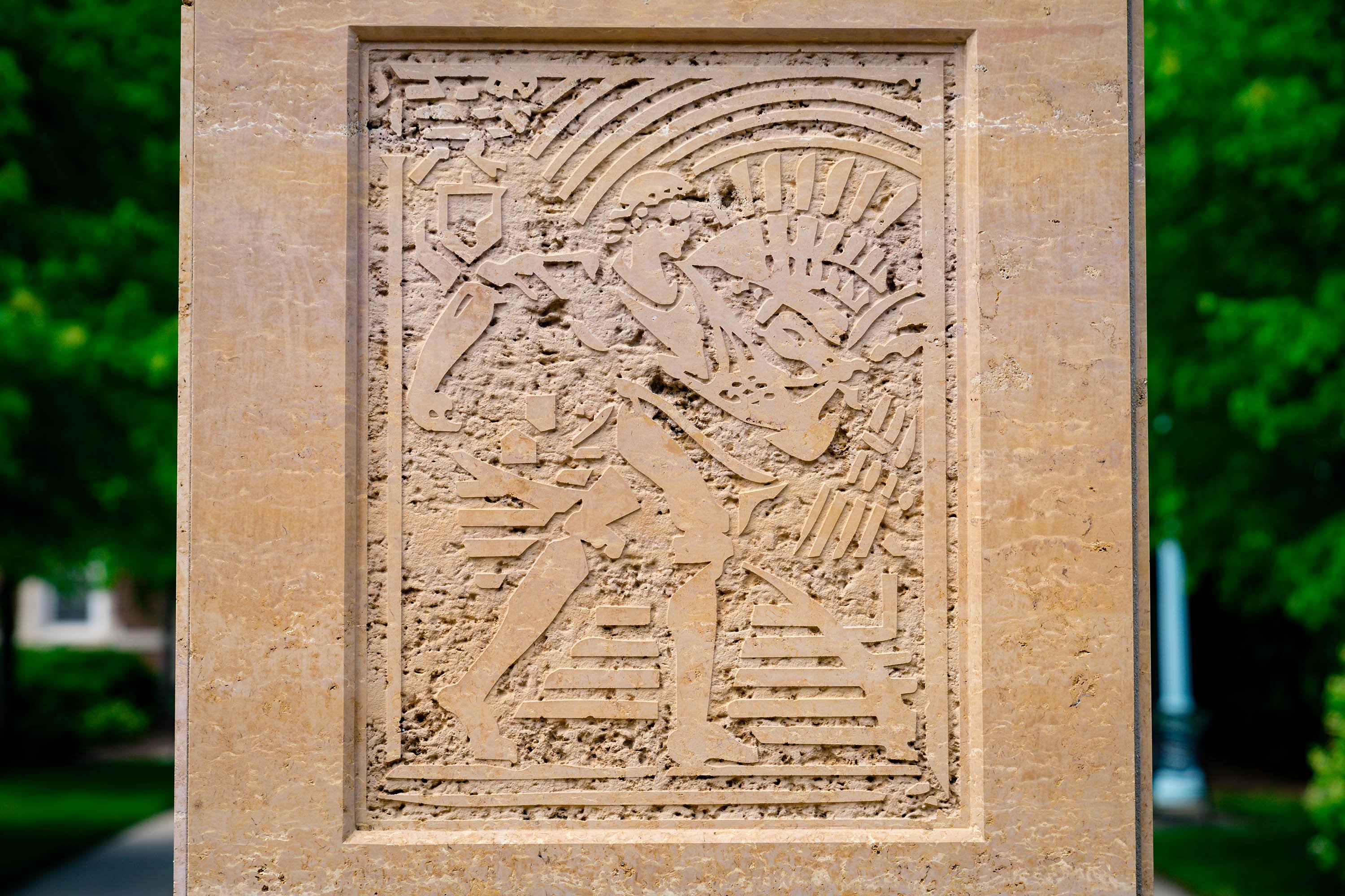 Carving on the base of a pillar in Benefactor's Plaza