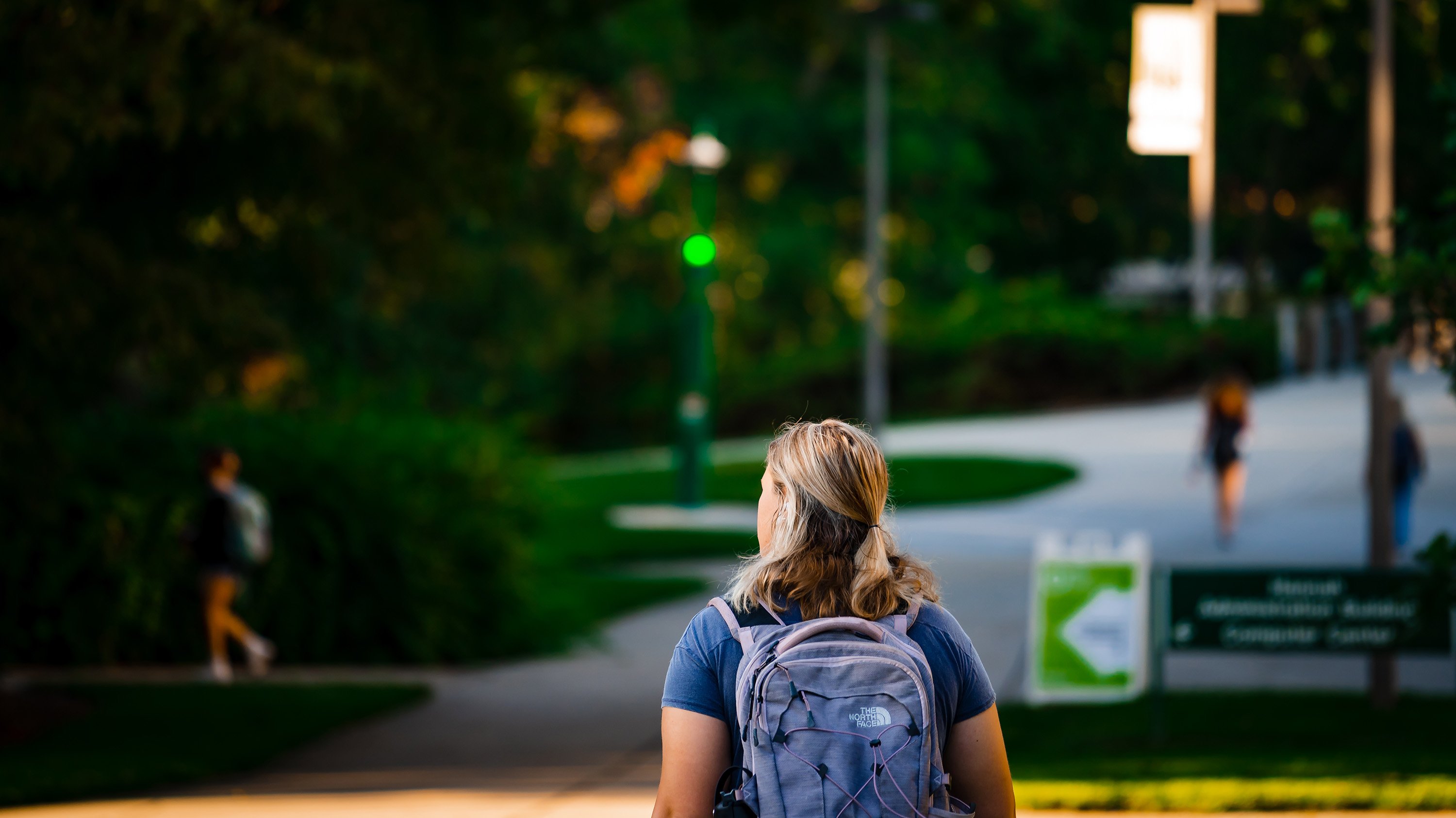 Student walking on campus