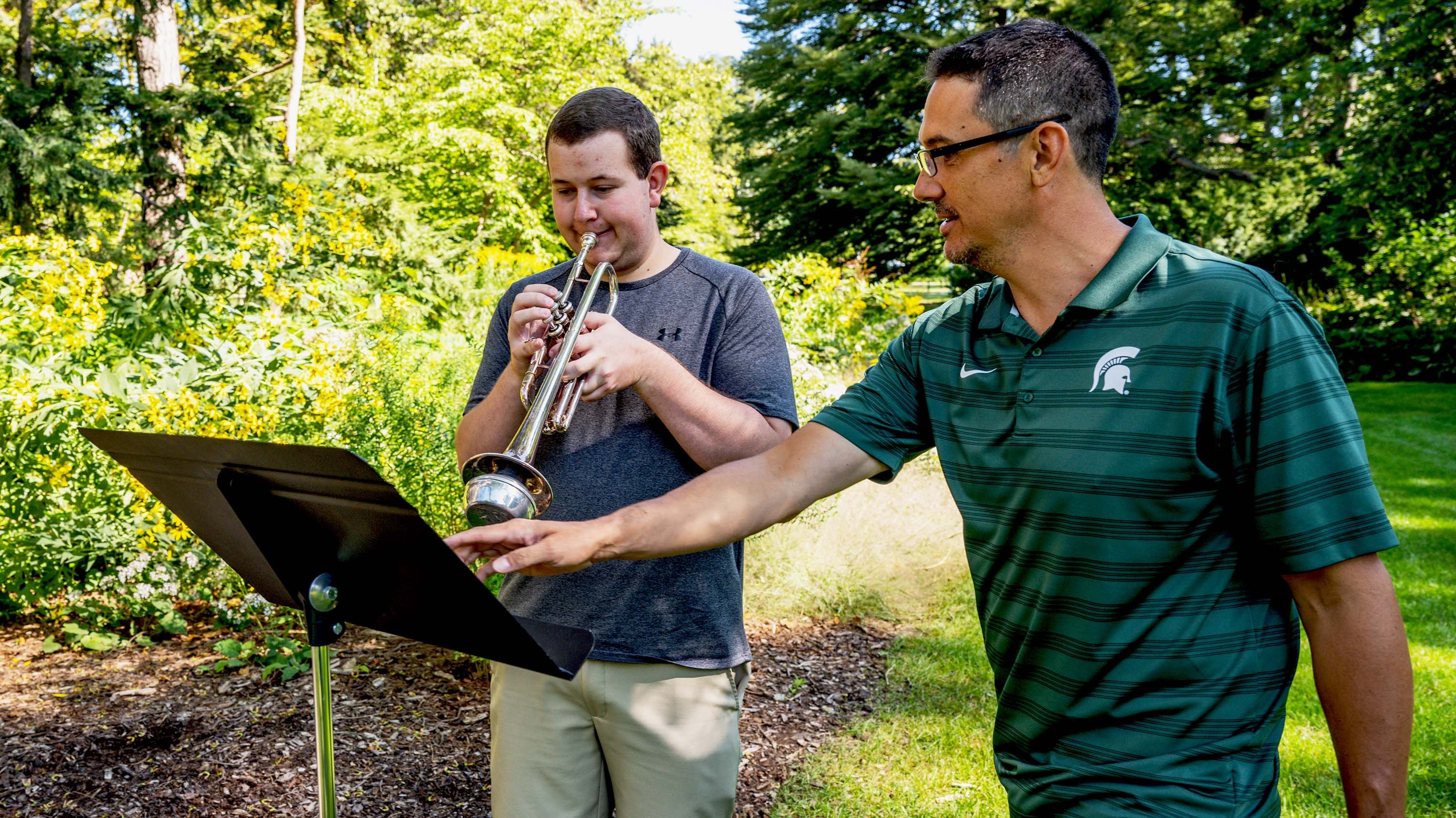 Student rehearsing trumpet with professor in Sleepy Hollow