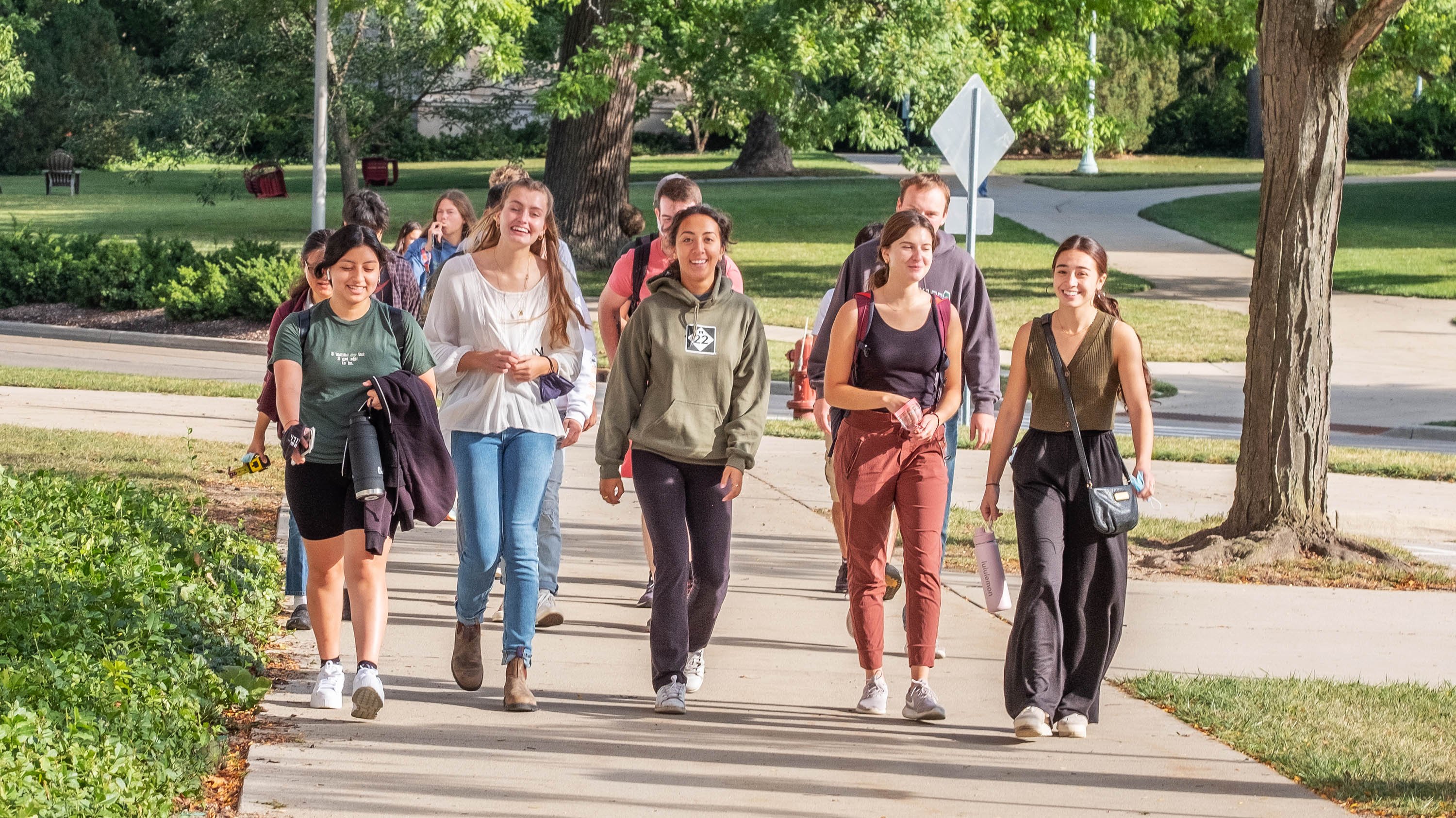 Group of students walking on campus